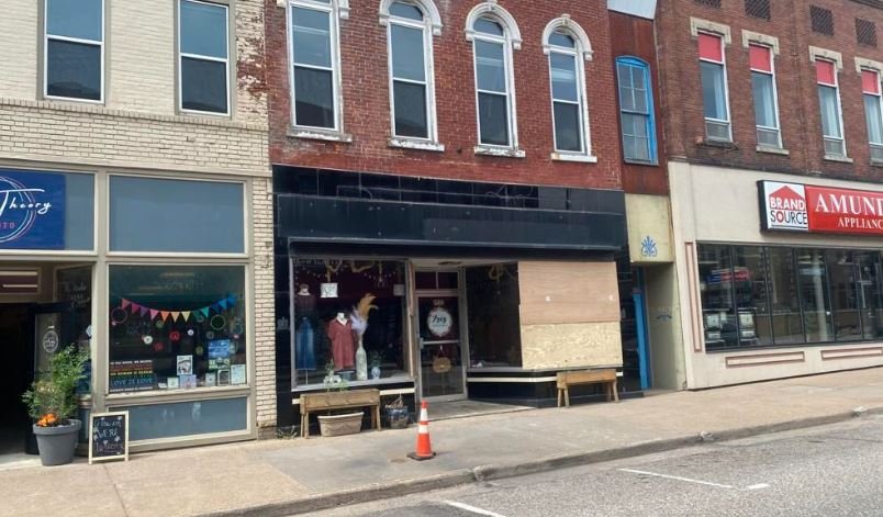 <i>WQOW via CNN Newsource</i><br/>The windows of a downtown Chippewa Falls business are boarded up Tuesday after the apartment above it caved into the shop overnight.