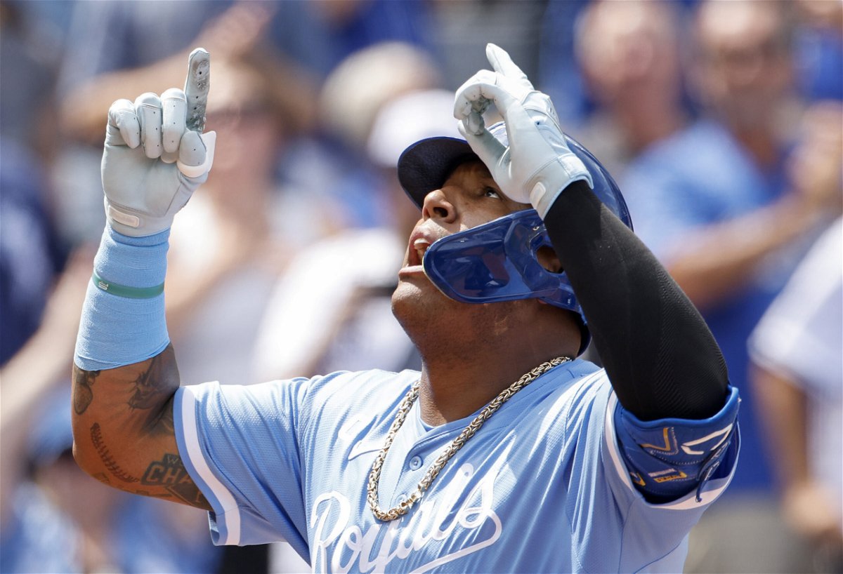 Kansas City Royals' Salvador Perez reacts as he crosses home plate after hitting a two-run home run during the seventh inning of a baseball game against the Cleveland Guardians in Kansas City, Mo., Sunday, June 30, 2024. (AP Photo/Colin E. Braley)