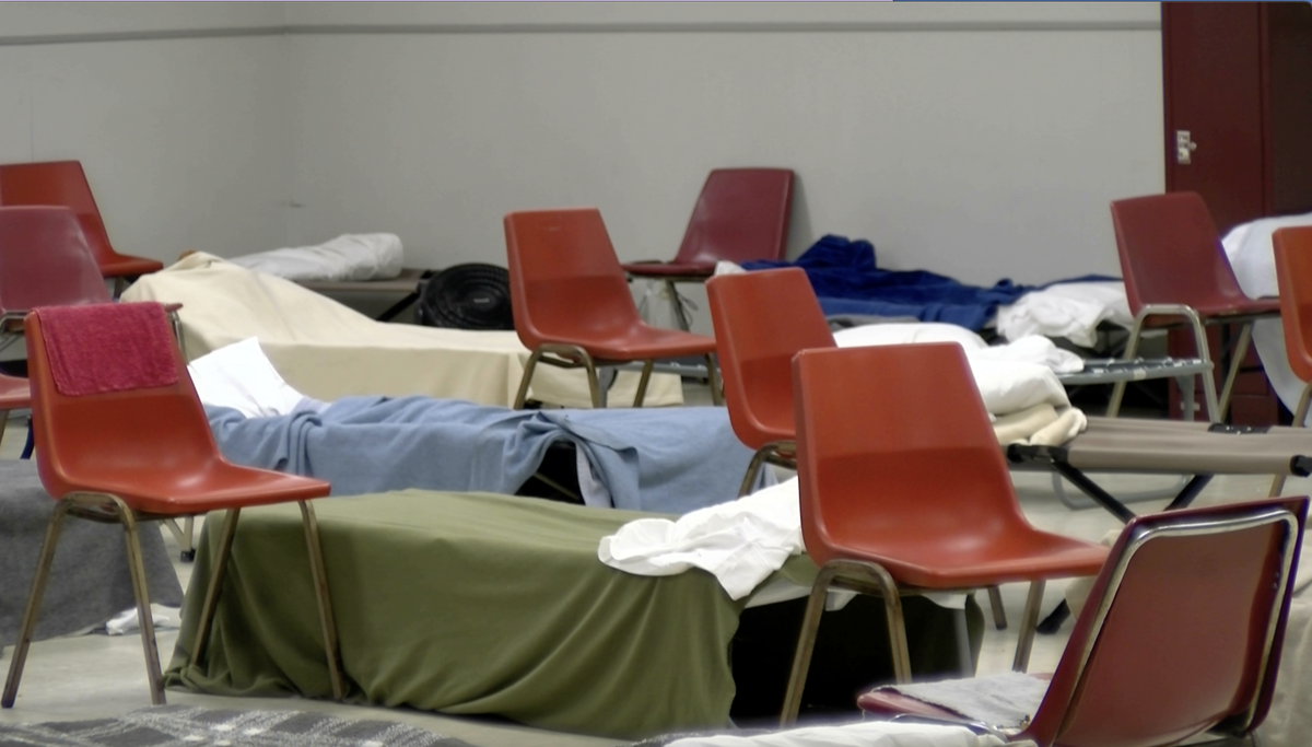 Cots at Room At The Inn are prepared on July 1, 2024, before the facility opens. 