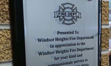 A grateful Windsor Heights family gave a plaque to the Windsor Heights Fire Department for its aid in a woman's final months.