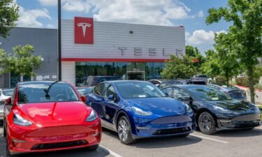 Tesla Model Y vehicles sit on the lot for sale at a Tesla store in Austin