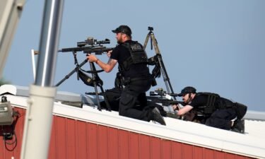 Police snipers return fire after shots were fired while former President Donald Trump was speaking at a campaign event in Butler
