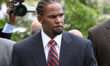 R. Kelly arrives at the Cook County Criminal Courts Building for his child pornography trial on May 20