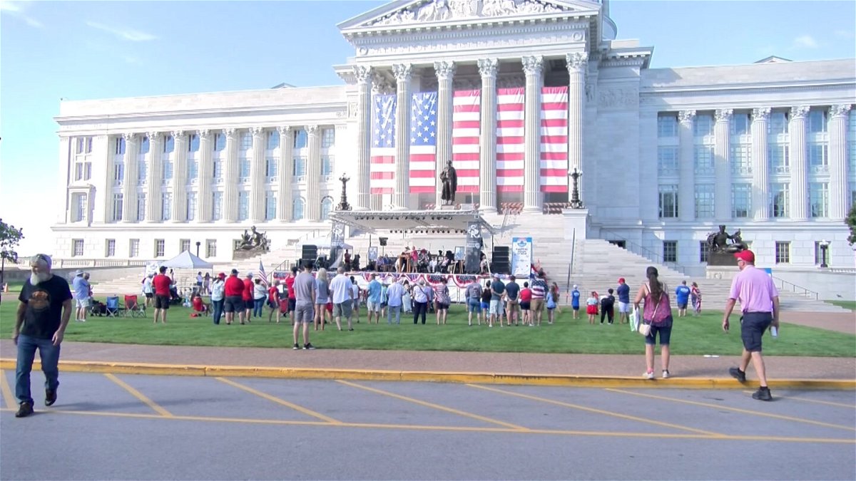 A number of people gather near a stage at the Capitol in Jefferson City during a performance Thursday, July 4, 2024, for the annual Salute To America celebration.