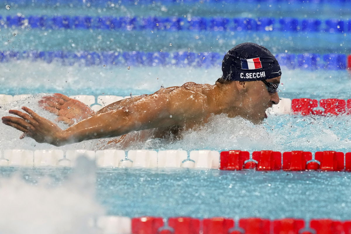 France's Clement Secchi competes in a men's 4x100-meter medley relay heat at the Summer Olympics in Nanterre, France, Saturday, Aug. 3, 2024. 