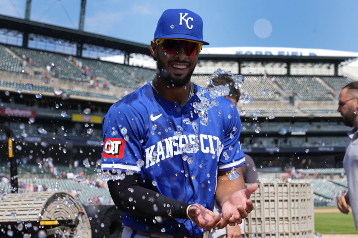 Kansas City Royals' MJ Melendez smiles as a cup of water is tossed at him after a baseball game against the Detroit Tigers, Sunday, Aug. 4, 2024, in Detroit. 