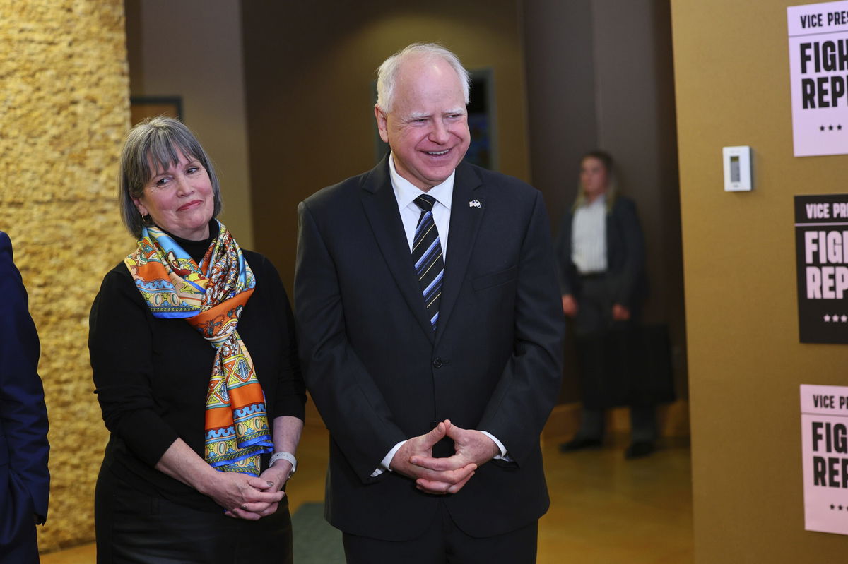 FILE - Rep. Betty McCullum, D-Minn., and Minnesota Governor Tim Walz, wait for Vice President Kamala Harris to speak at Planned Parenthood, March. 14, 2024, in St. Paul, Minn.