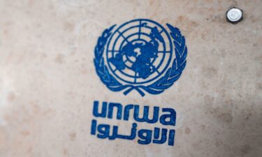 UNRWA's lettering on a sign at the girls' school in the Talibeh refugee camp.