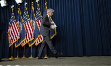 Federal Reserve Chair Jerome Powell departs after a press conference at the Federal Reserve in Washington