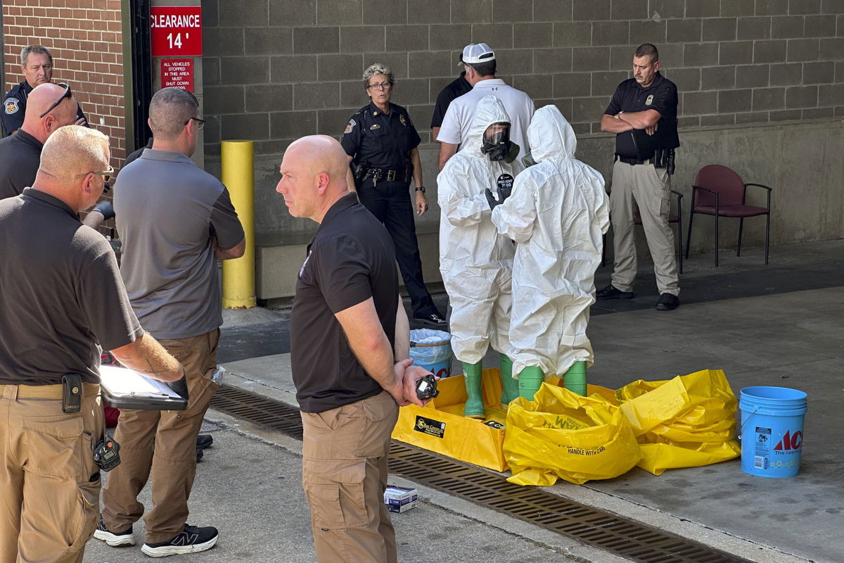 A hazmat crew from the National Guard's Civilian Support Team investigates after a suspicious package was delivered to election officials at the Missouri Secretary of State's Jefferson City, Mo., office on Tuesday Sept. 17, 2024.