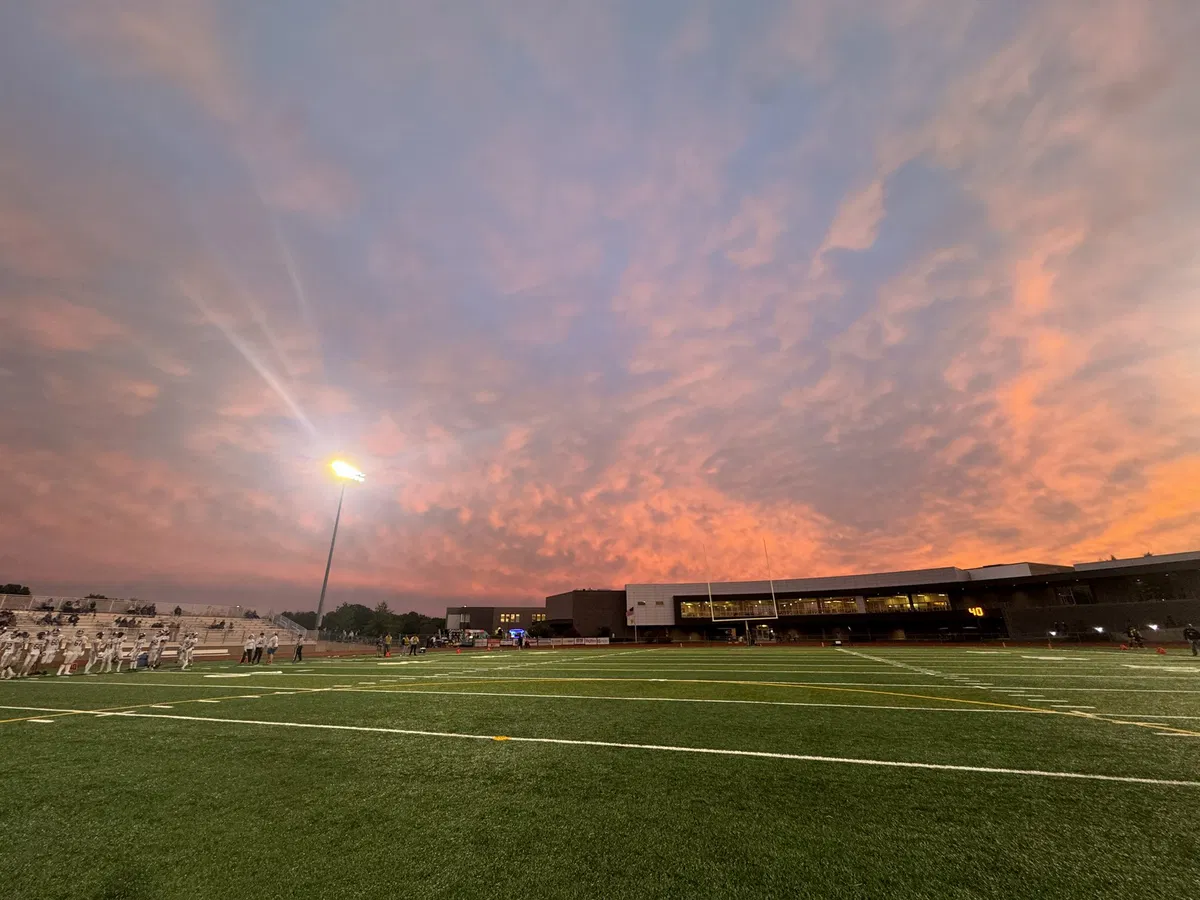 The sun sets before the Camdenton Lakes take on the Battle Spartans on Friday, Sept. 27, 2024 in Columbia. 