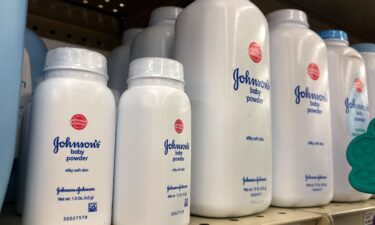 Containers of Johnson's baby powder made by Johnson and Johnson are displayed on a shelf in July 2018 in San Francisco