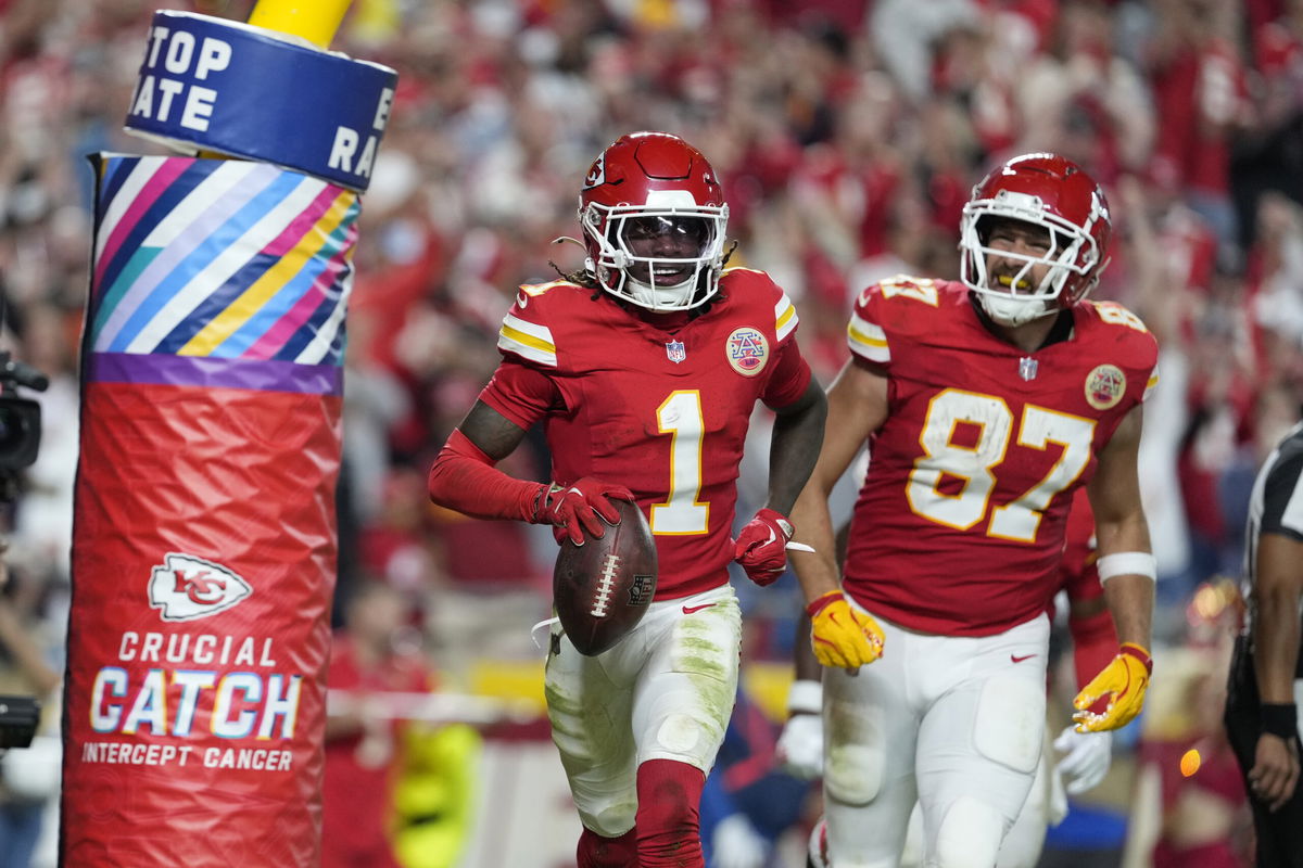 Kansas City Chiefs wide receiver Xavier Worthy (1) celebrates after scoring as teammate Travis Kelce (87) watches during the second half of an NFL football game against the New Orleans Saints Monday, Oct. 7, 2024, in Kansas City, Mo. 