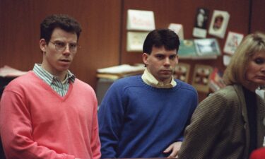 Erik Menendez (R) and brother Lyle listen to court proceedings during a May 17