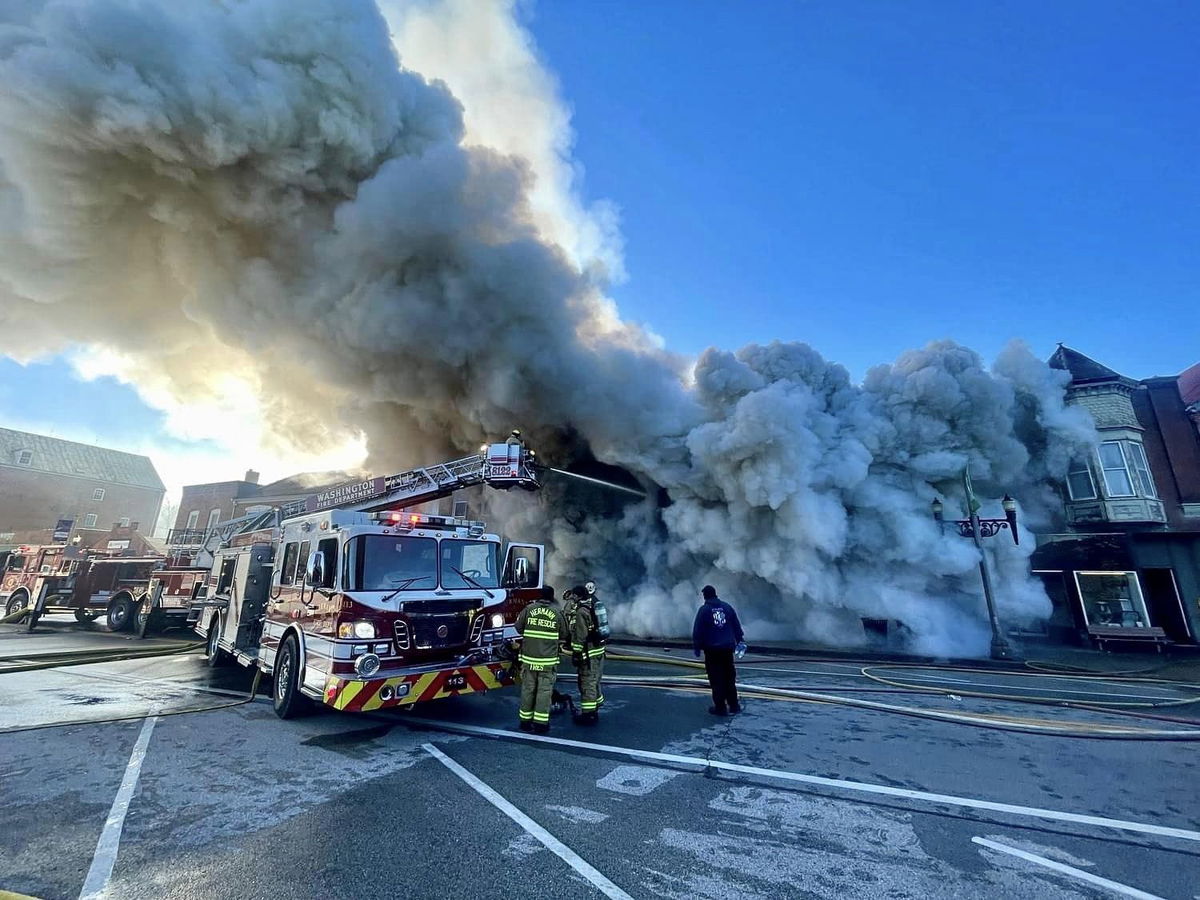 Firefighters work at a building on First Street in Hermann on Monday, Nov. 11, 2024.