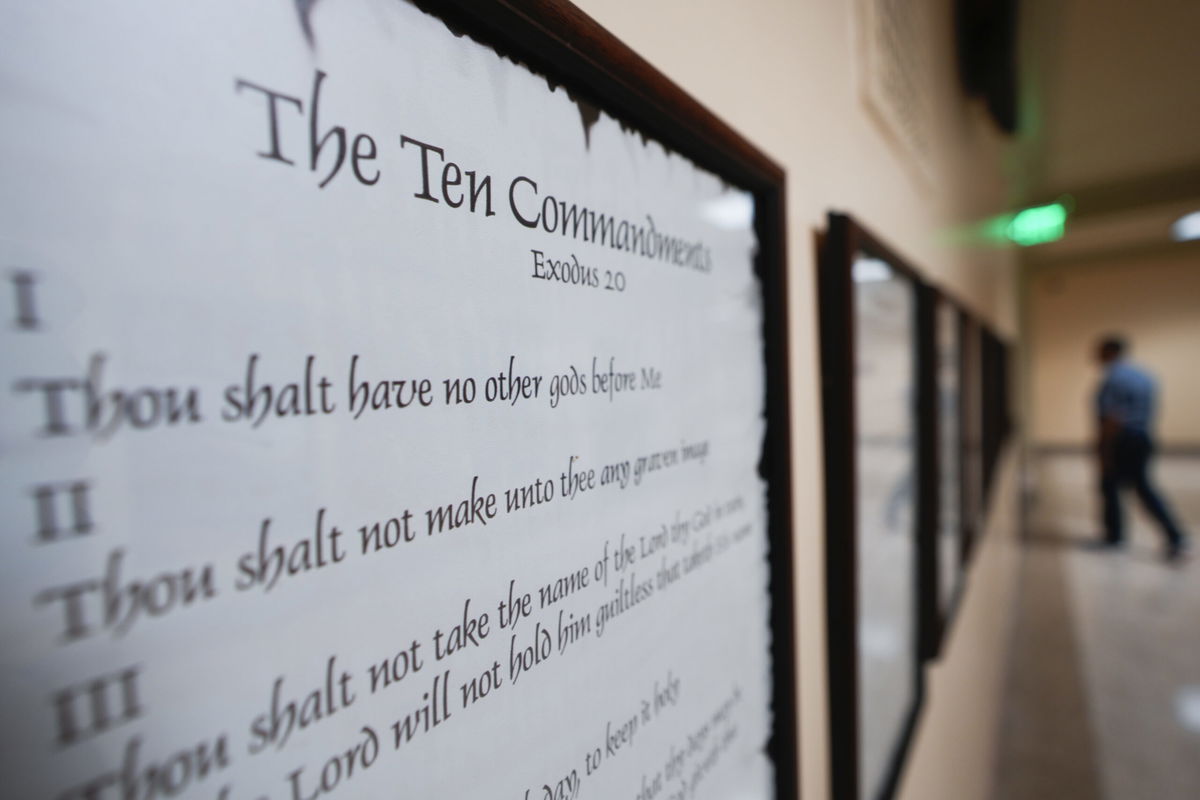 FILE - A copy of the Ten Commandments is posted along with other historical documents in a hallway of the Georgia Capitol, June 20, 2024, in Atlanta. 