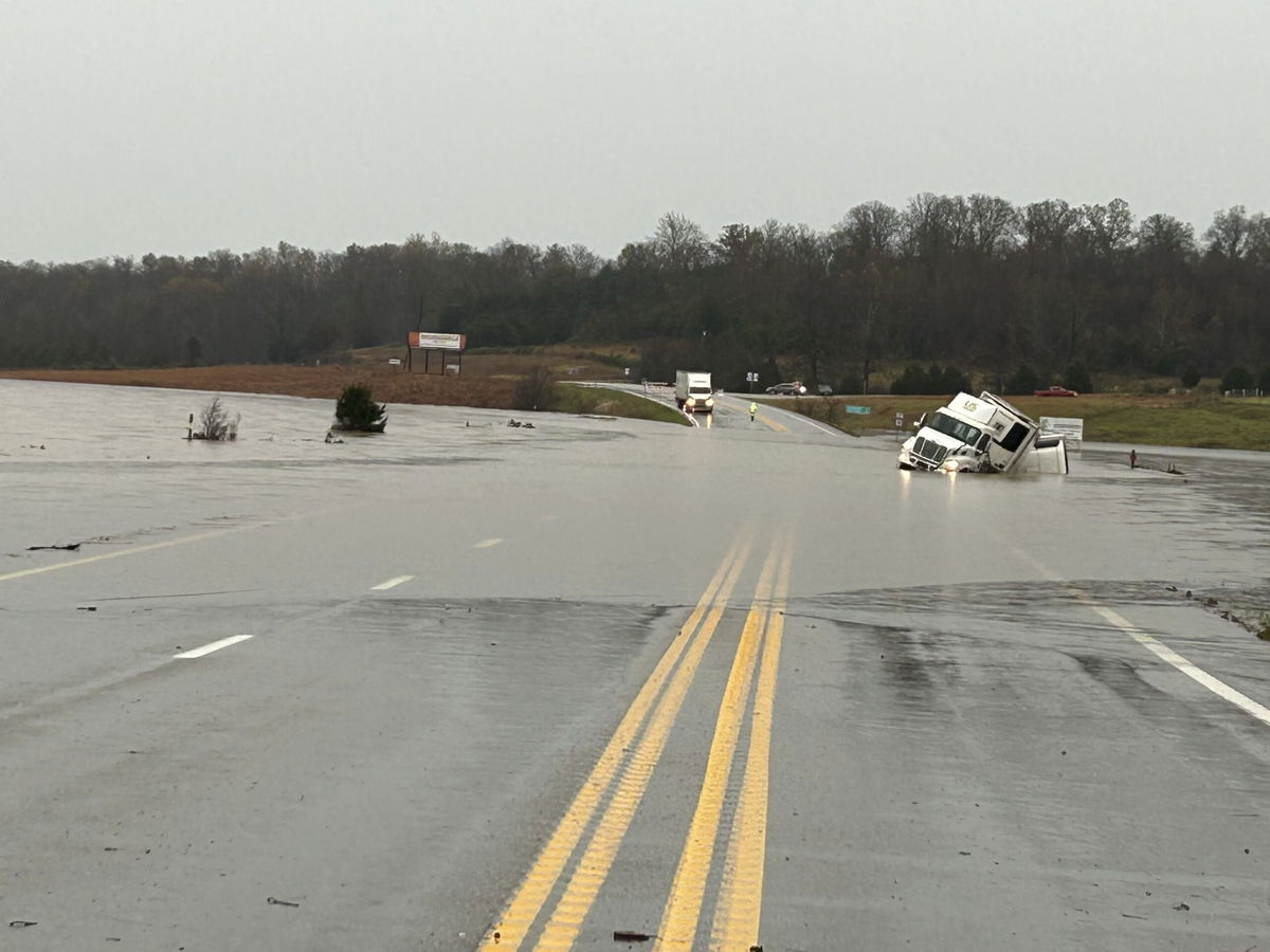 In a photo released by the Missouri State Highway Patrol, tractor trailer sits submerged in flood water on US 63 just north of Cabool, Mo., Tuesday, Nov. 5, 2024.