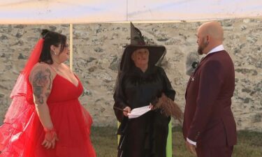 New Jersey couple channels Beetlejuice and Lydia for a Halloween wedding.