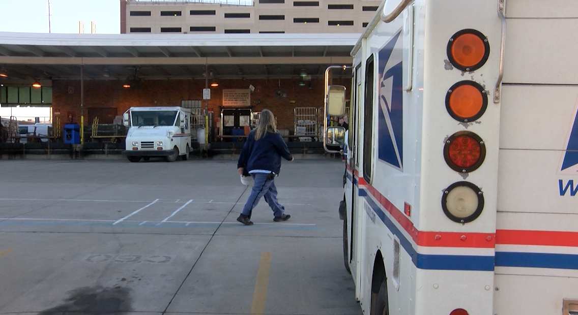 A mail truck parked behind Columbia's post office in Downtown Columbia.