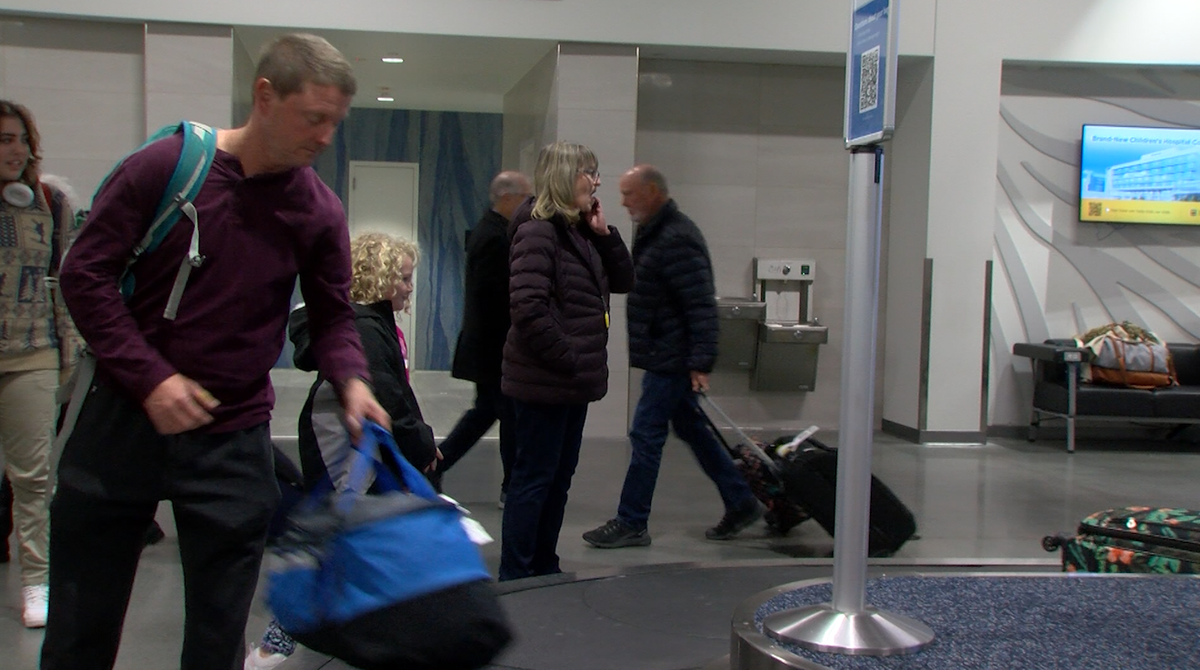 Travelers are seen Tuesday, Nov. 26, 2024, at Columbia Regional Airport, days before Thanksgiving Day.