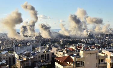 Smoke billows above Beirut's southern suburbs after an Israeli airstrike on Tuesday.