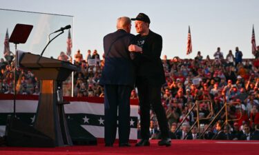 Tesla CEO Elon Musk joins former President and Republican presidential candidate Donald Trump during a campaign rally at the site of his first assassination attempt in Butler