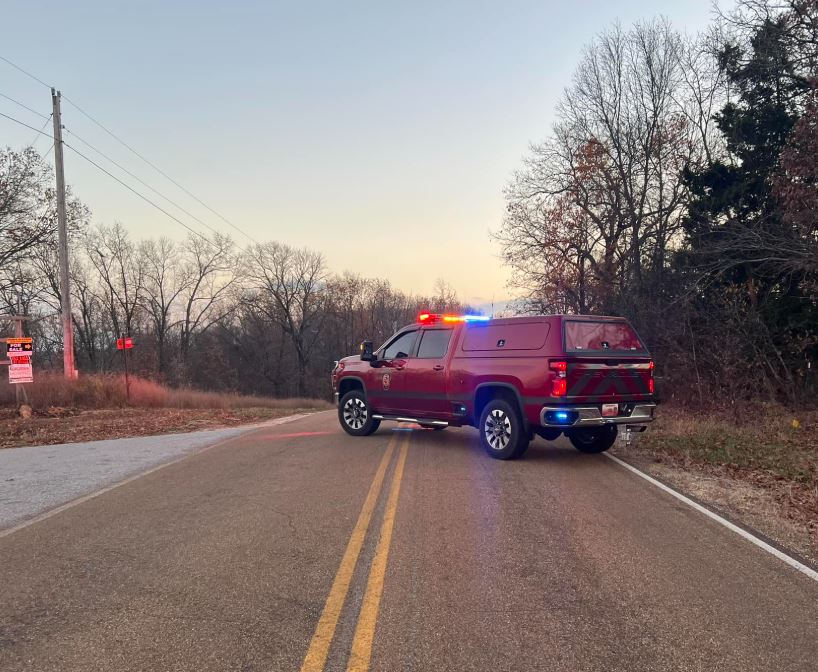 First responders block off Route F in Camden County while investigating a fatal crash. 