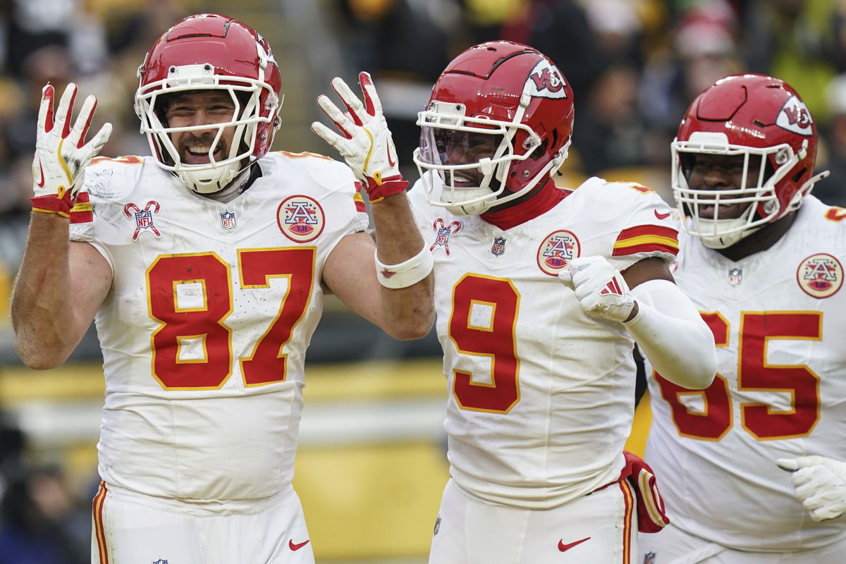 Kansas City Chiefs tight end Travis Kelce (87) celebrates his touchdown against the Pittsburgh Steelers during the second half of an NFL football game, Wednesday, Dec. 25, 2024, in Pittsburgh. (AP Photo/Matt Freed)