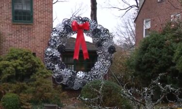 A Baltimore man makes giant holiday wreaths out of hubcaps.