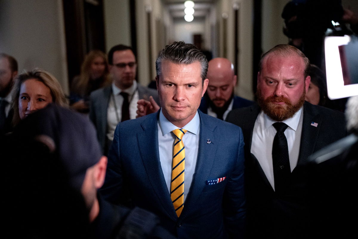 Pete Hegseth walks through the Russell Senate Office Building on Capitol Hill on December 3, in Washington, DC.
