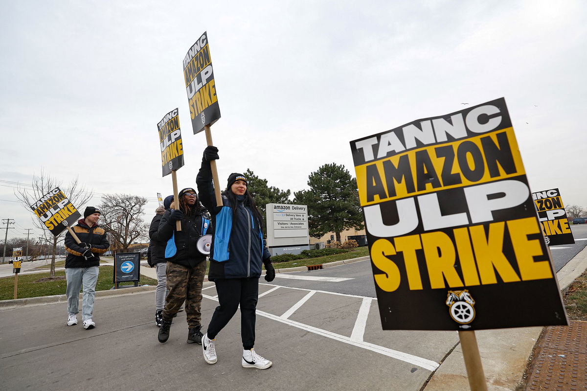 Amazon delivery drivers walk the picket line in Skokie, Illinois, on December 19.
