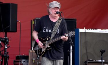 Neil Young performing at the 2024 New Orleans Jazz & Heritage Festival.