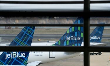 JetBlue planes sit at Ronald Reagan Washington National Airport in Arlington