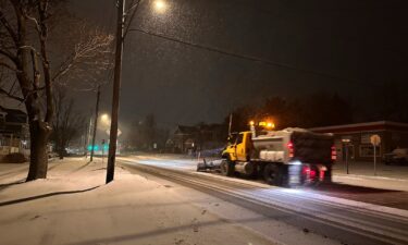 A snowplow passes through Lowville