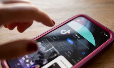 TikTok is seen in the app store of an iPhone. A board member at TikTok’s parent company said that a deal to save the app from disappearing in the United States will be done soon.