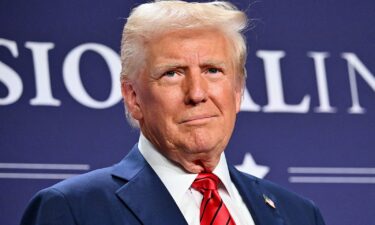 President Donald Trump looks on after delivering remarks at the House Republican Members Conference Dinner in Miami on January 27.