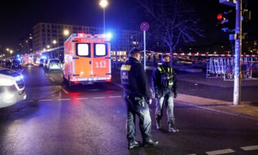 Police officers work at the cordoned off scene where a person was injured near the Memorial to the Murdered Jews of Europe in Berlin on February 2.