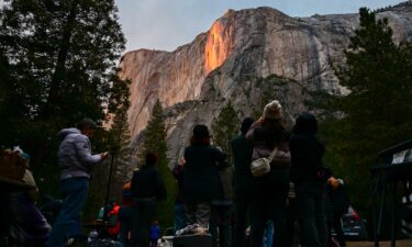 A view of the Firefall effect on El Capitan is seen here during sunset at Horsetail Fall in Yosemite National Park on February 19. Visitors to America’s national parks can expect shorter hours