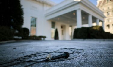 A television microphone lies on the ground outside the White House West Wing on January 29 in Washington