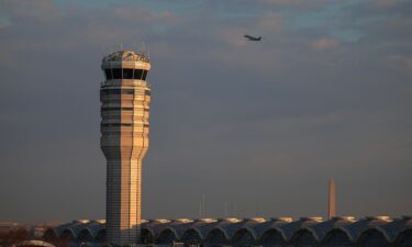 The air traffic control tower is seen at the Reagan National Airport on February 3 in Arlington