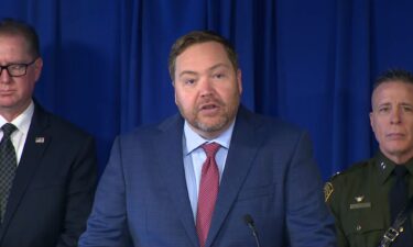 Acting United States Attorney Joseph T. McNally speaks during a press conference in Los Angeles on March 3. Four men are facing federal charges