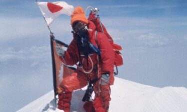 Junko Tabei and Ang Tsering stand near Mount Everest camp two