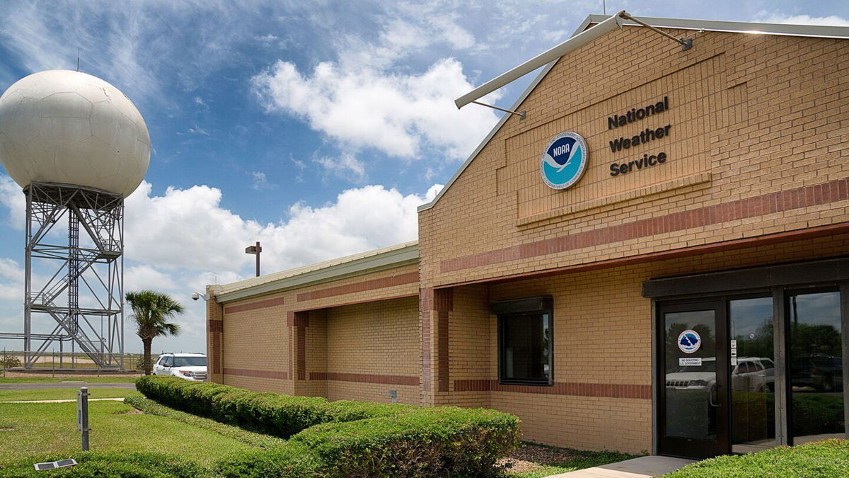 The National Weather Service forecast office in Brownsville, Texas, seen with their Doppler radar tower nearby.