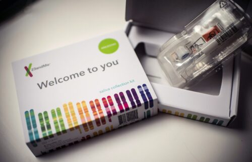 This illustration picture shows a saliva collection kit for DNA testing displayed in Washington