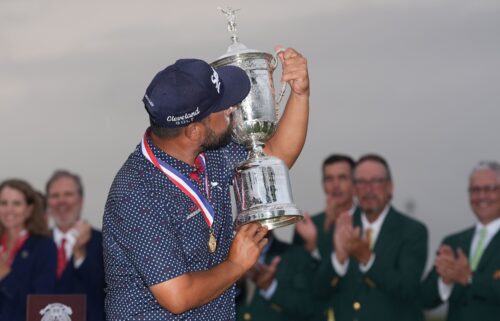 J.J. Spaun putts on the 18th green to win during the final round of the U.S. Open golf tournament.