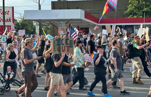 Demonstrators denounced the Trump administration at a "No Kings" protest in Salt Lake City -- one of 2