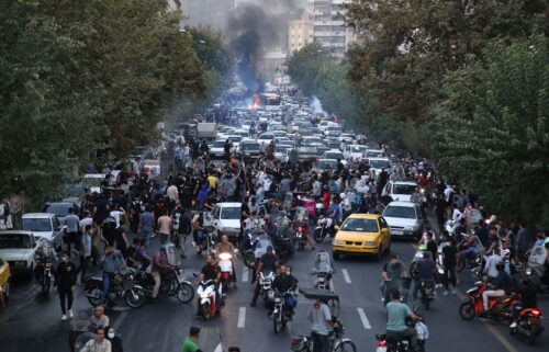 Demonstrators take part in anti-Israel and anti-US demonstrations in Tehran