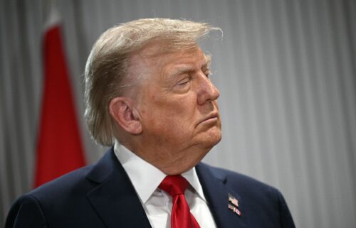 President Donald Trump looks on as Canadian Prime Minister Mark Carney speaks as they meet during the Group of Seven Summit at the Pomeroy Kananaskis Mountain Lodge in Kananaskis