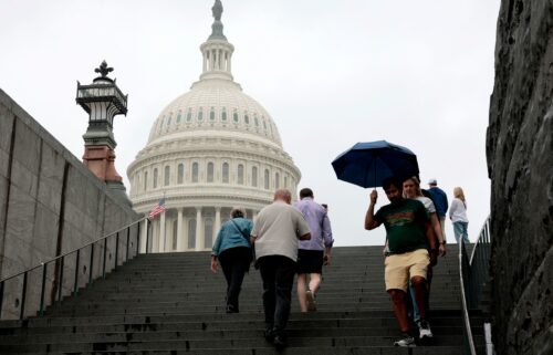 Tourists walk near the US Capitol visitor center on June 16 in Washington