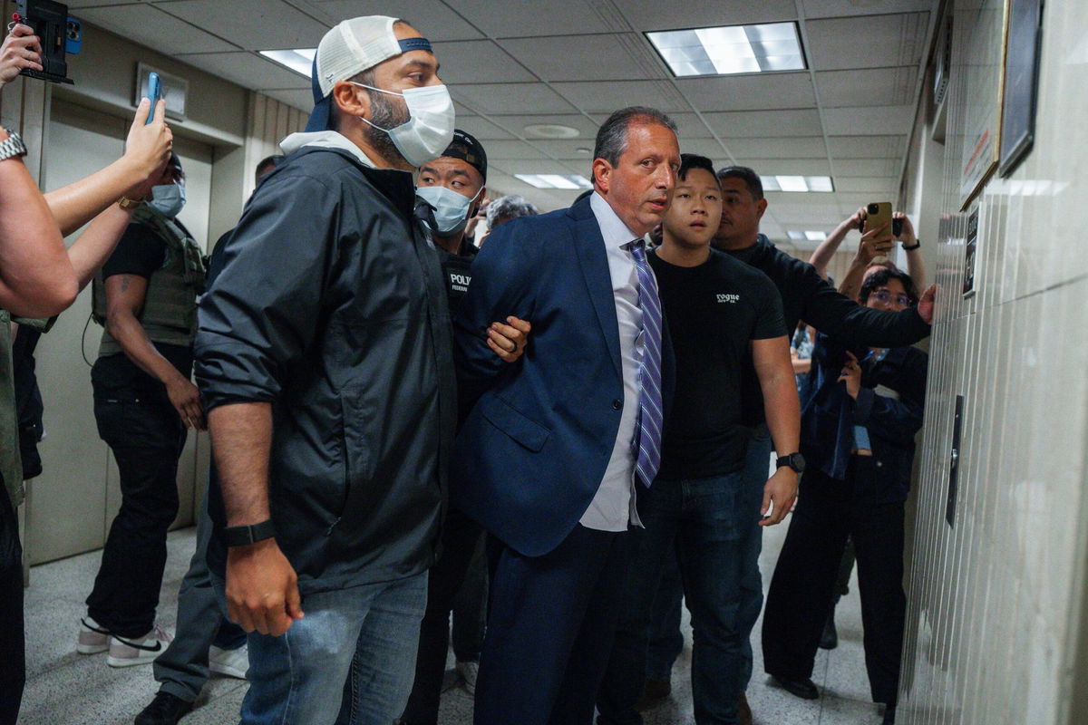 New York City Comptroller Brad Lander is placed under arrest by ICE and FBI agents outside federal immigration court on Tuesday, June 17, 2025, in New York.